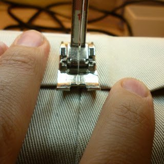 tack with a stitch on the seam lines