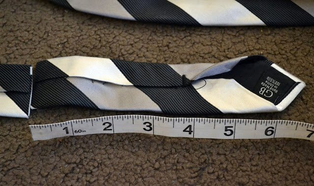 cut back of tie to 7 inches