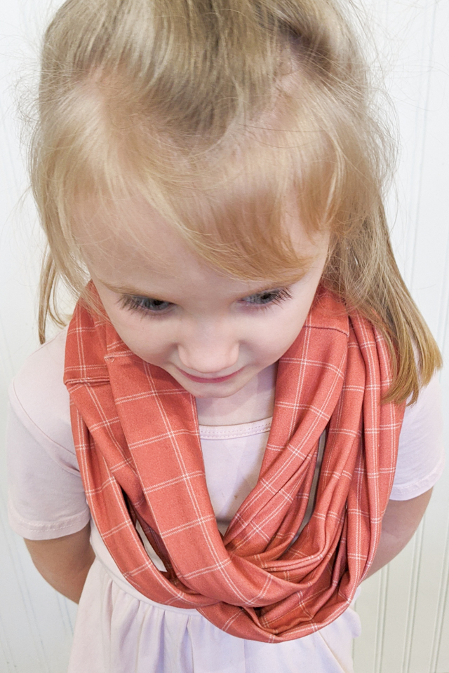 little girl wearing infinity scarf