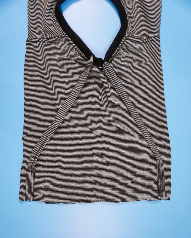 take both hem ends down to the corners of the back short side