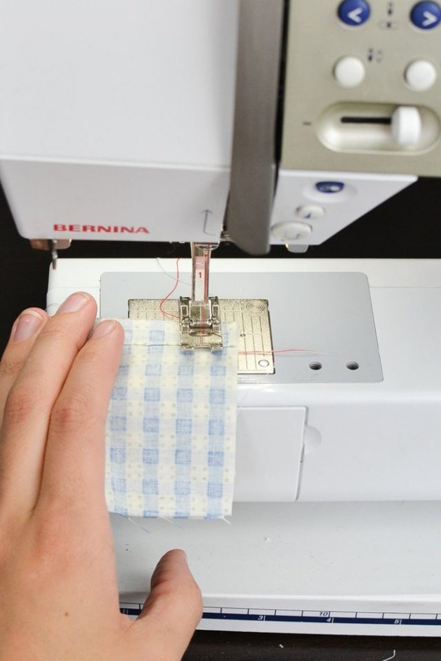fold the fabric in the corner to get neat stitches
