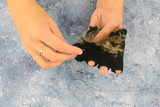 hand sew fur onto back of gloves