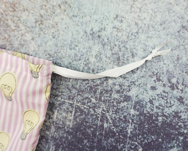 tie ends of ribbon in a knot