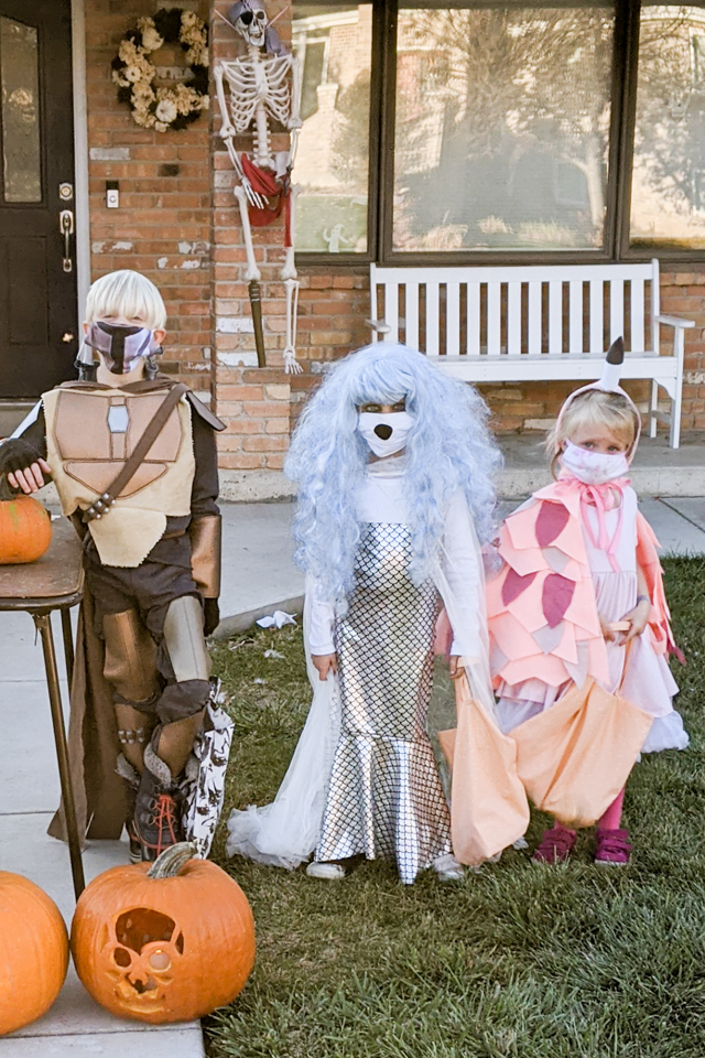 kids wearing masks halloween