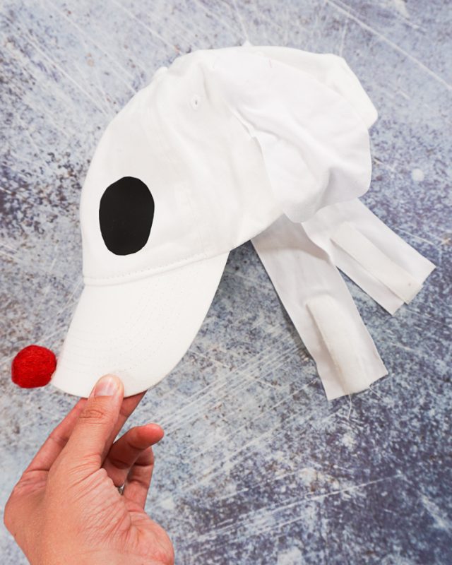 homemade dog ghost costume add two chin straps to the cap