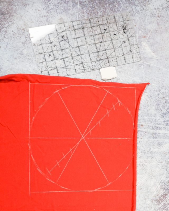 draw a circle on scrap of orange fabric