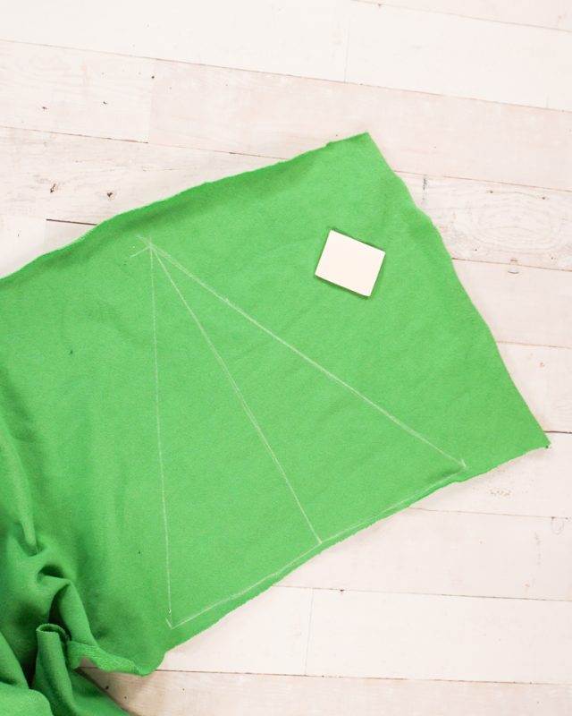 draw triangle on green fabric