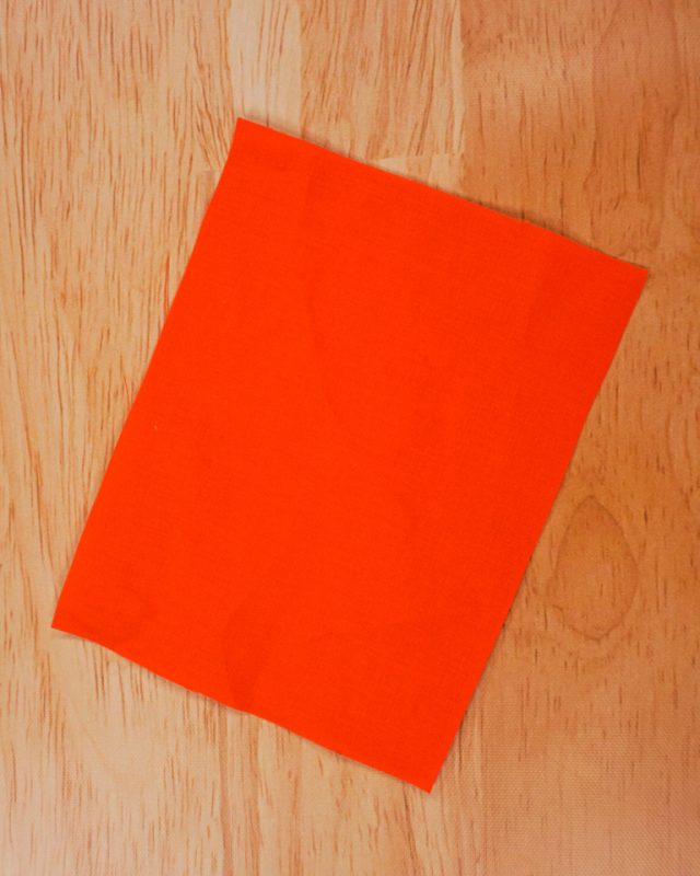 cut orange fabric rectangle