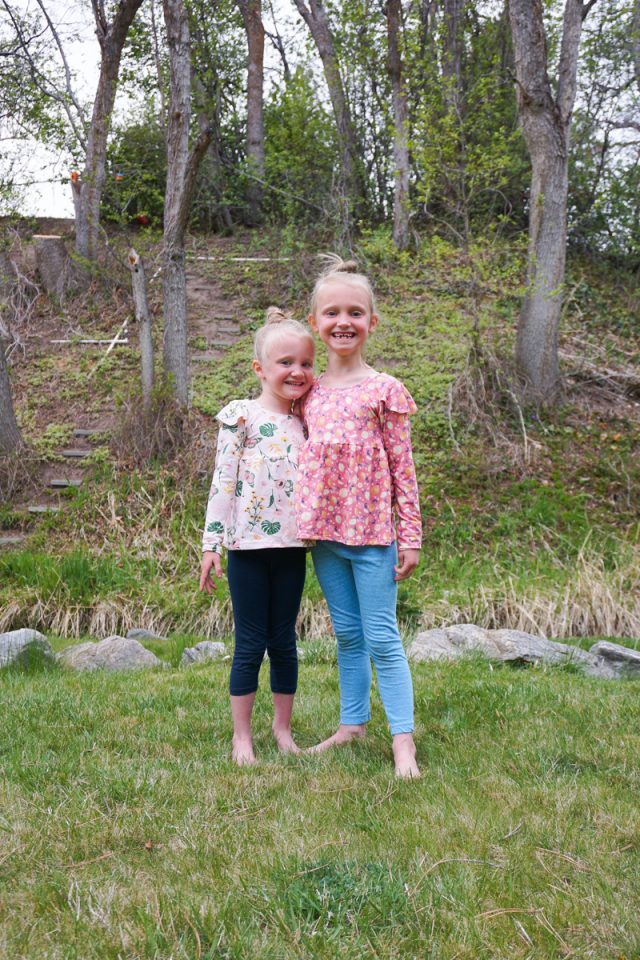 two girls wearing babydoll tops