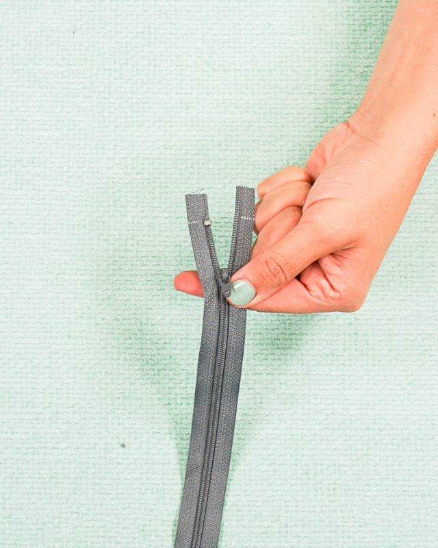 top zipper stop front