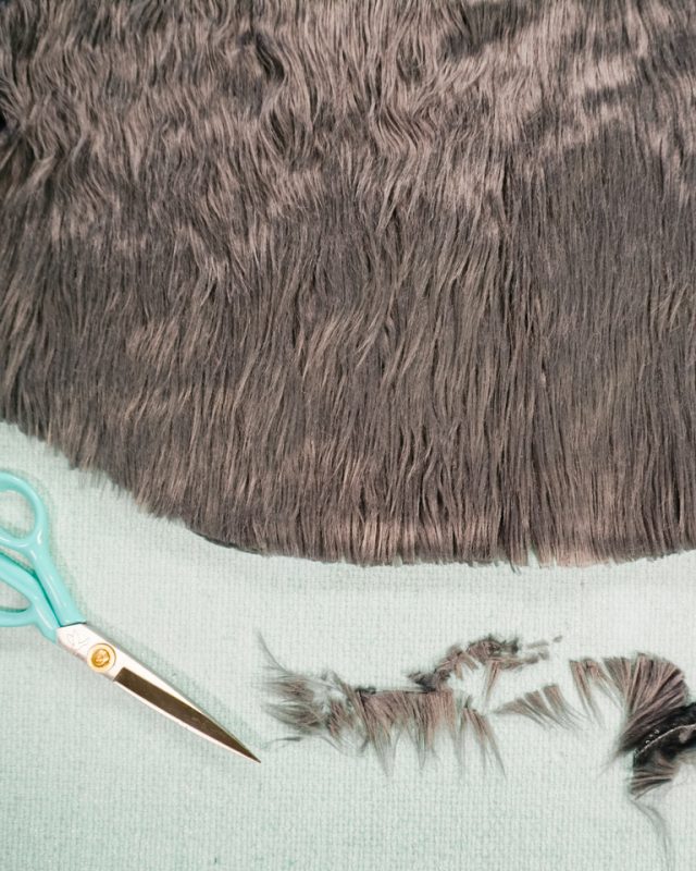 trim the fur around the skirt so it doesn't extend too much