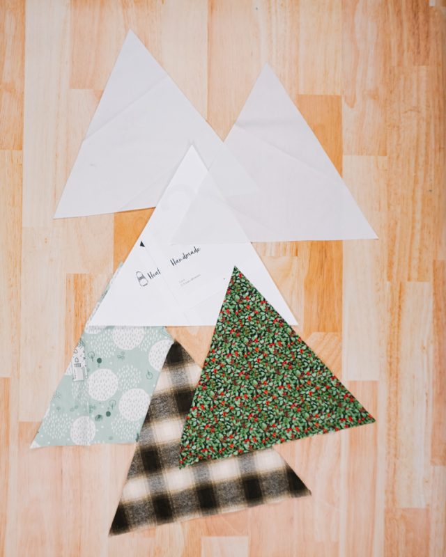 cut out 3 green triangles and 3 white triangles