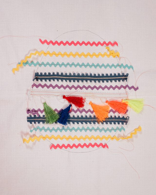 sew each trim on between egg lines