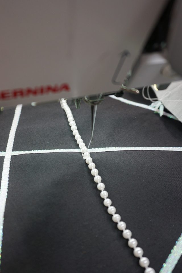 sew parts of trim in place by zigzagging without foot