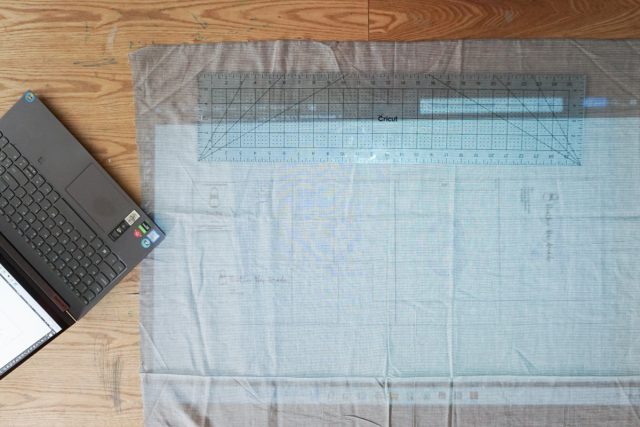 projected sewing pattern on fabric