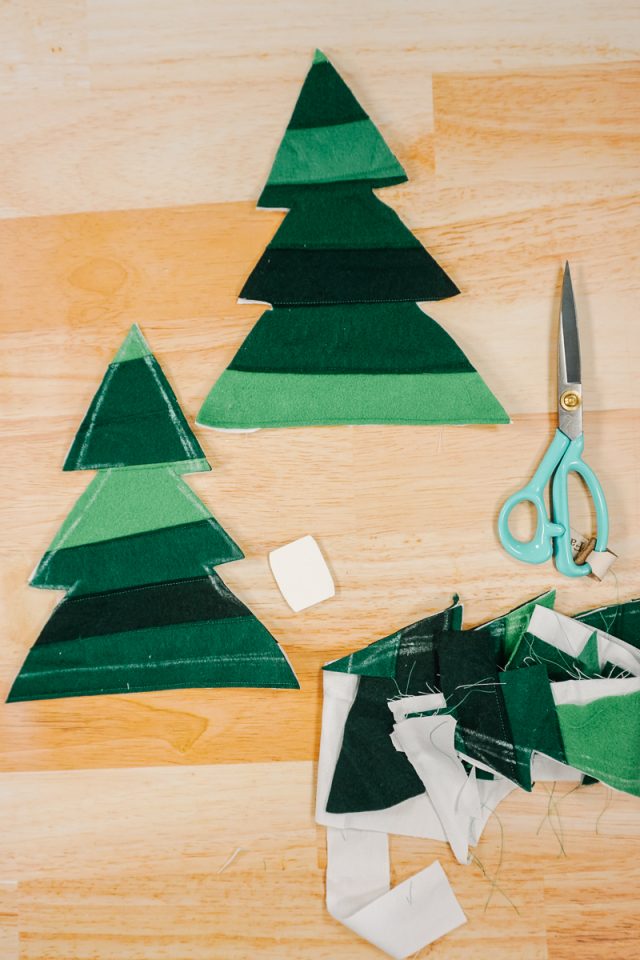 cut out tree shapes from felt