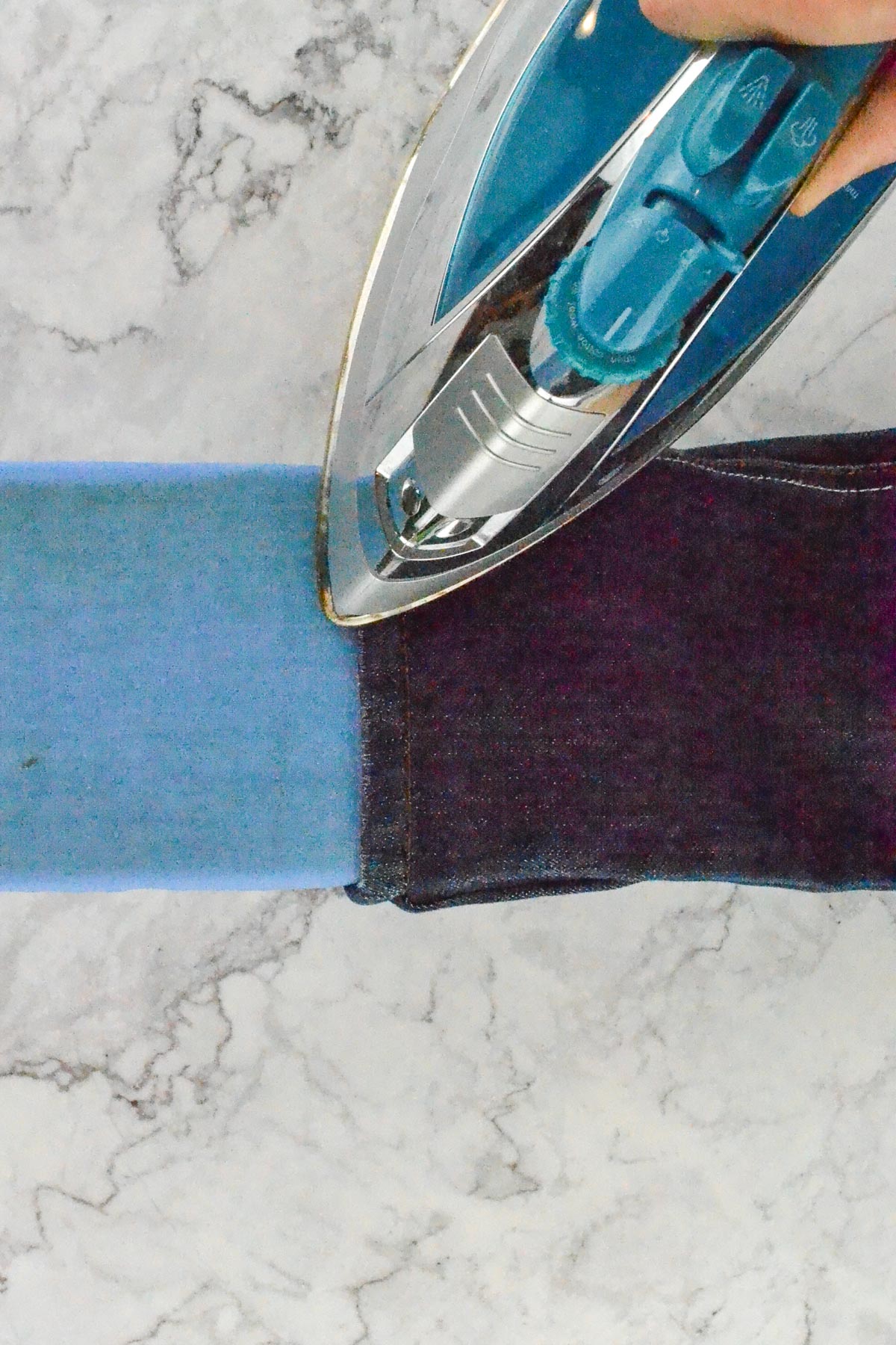 iron the hem in place