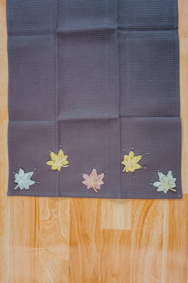 pin all the patches in a pattern on the towel