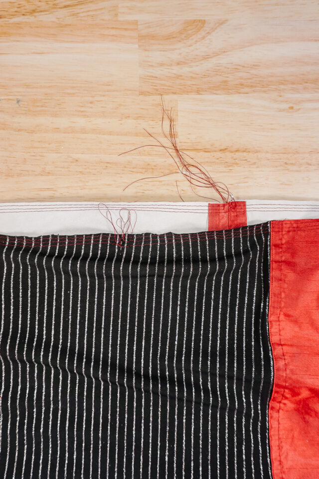 sew two rows of basting stitching along the top of skirt