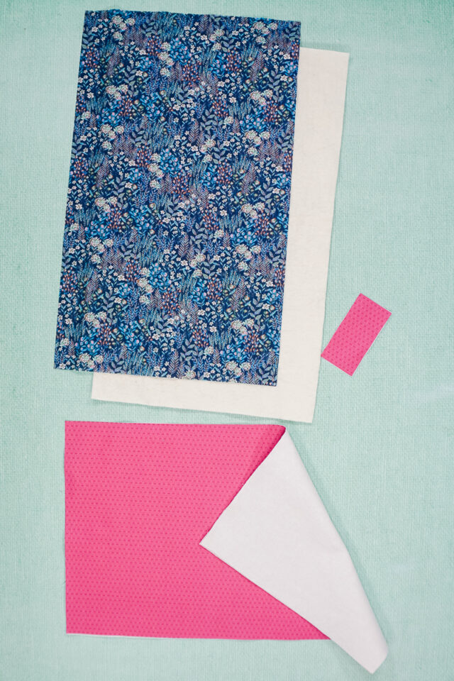 cut out fabric, batting, and interfacing. iron interfacing onto fabric