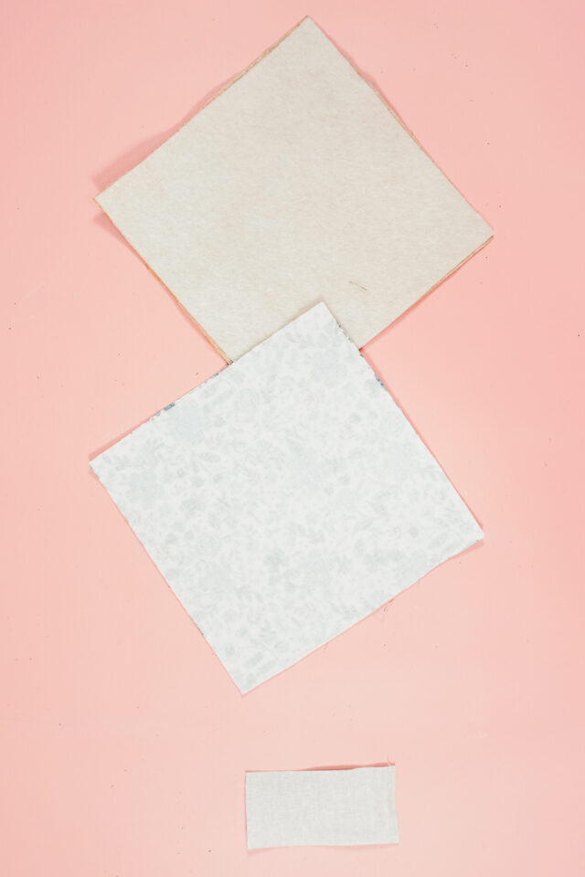 apply interfacing and fusible fleece to the back of the fabric