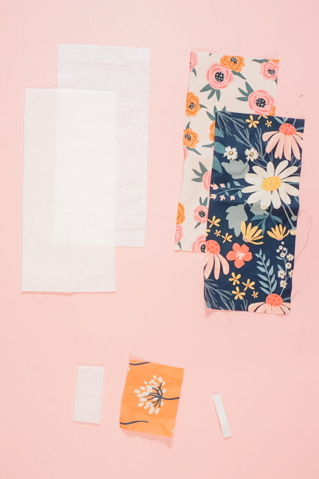 cut out fabric, interfacing, and fusible fleece