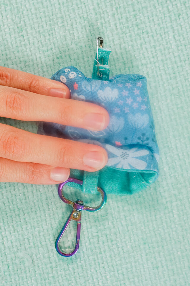 use safety pin to pull loop ends through case and through holes
