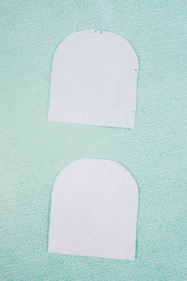 sew case and lining right sides together leaving holes at marks