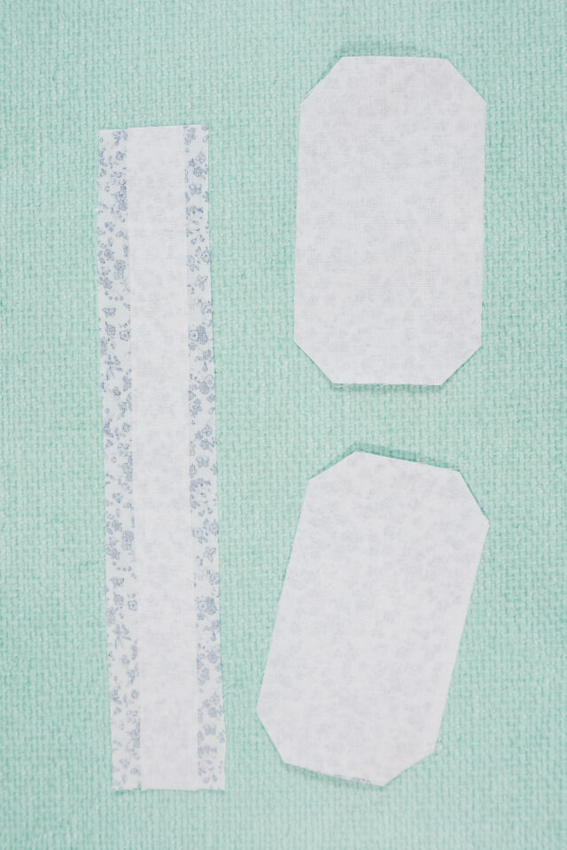 iron the interfacing to the back of the fabric