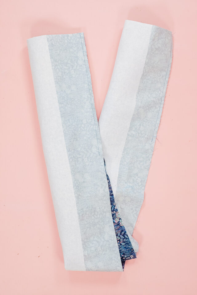 pin long edges right sides together and sew in 10 inches from each end