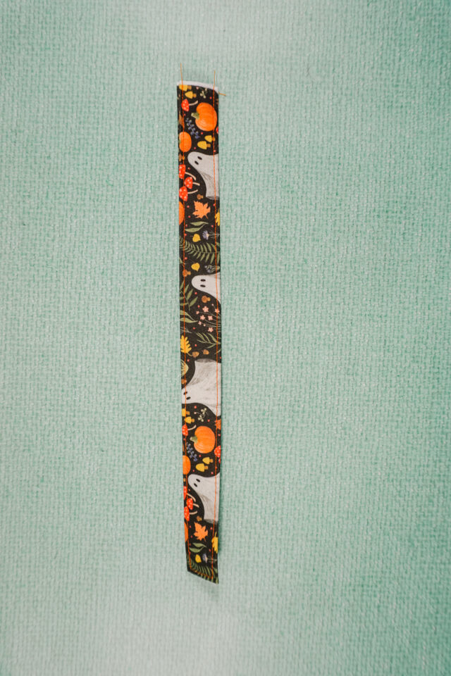 fold handle and stitch down each side