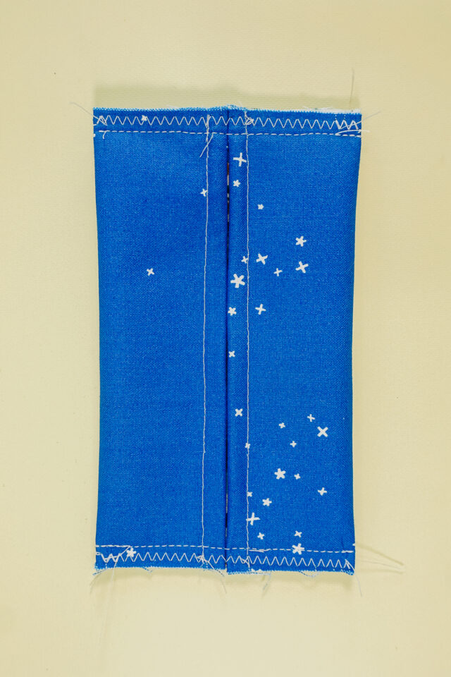 finish the seam allowances with a zigzag stitch or serger