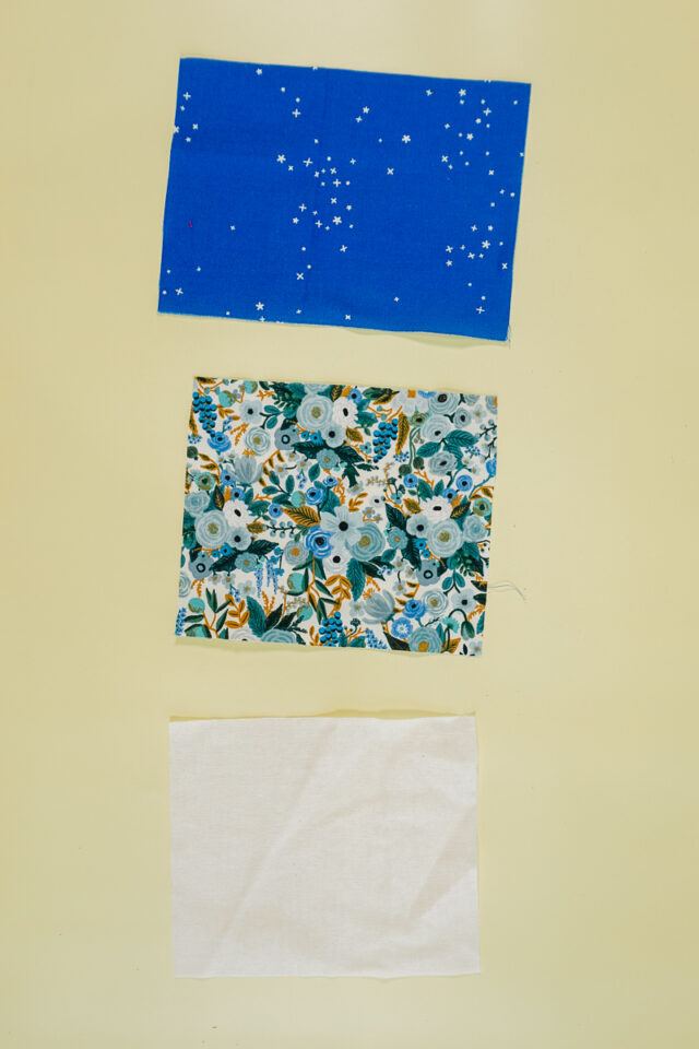 cut two pieces of fabric and one piece of fusible interfacing