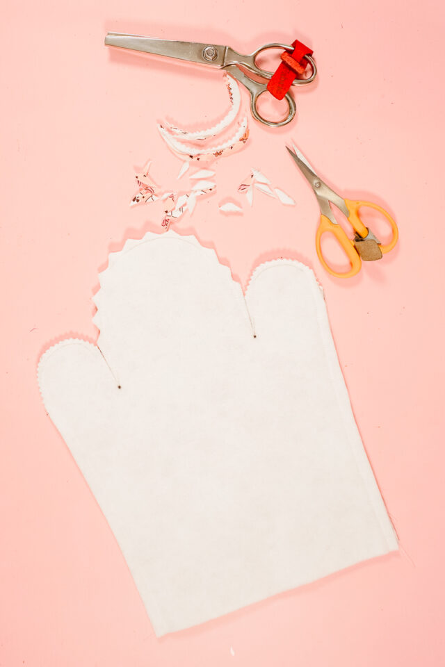 notch the outer curves of the hands and head