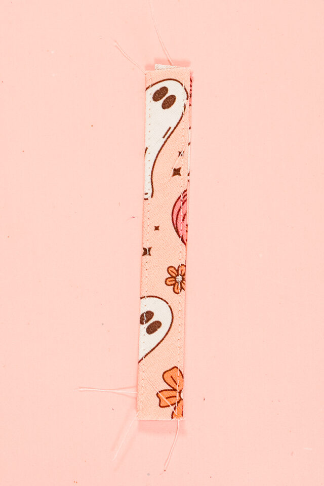 sew along each long side of the loop