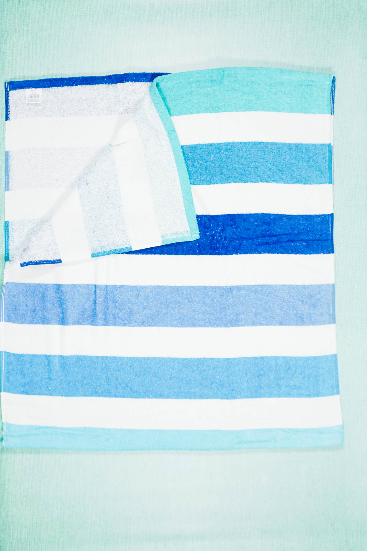 fold towel in half matching short sides