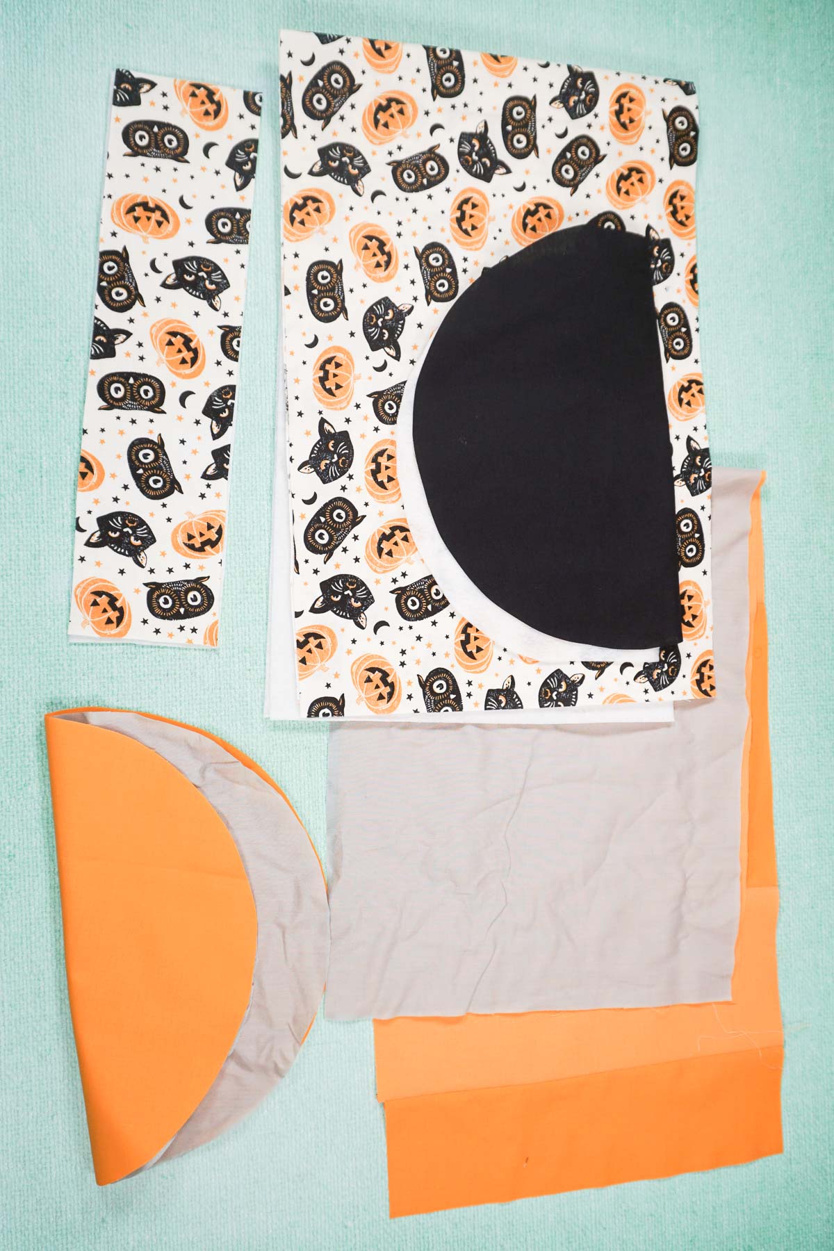 cut out fabric, fleece, and interfacing