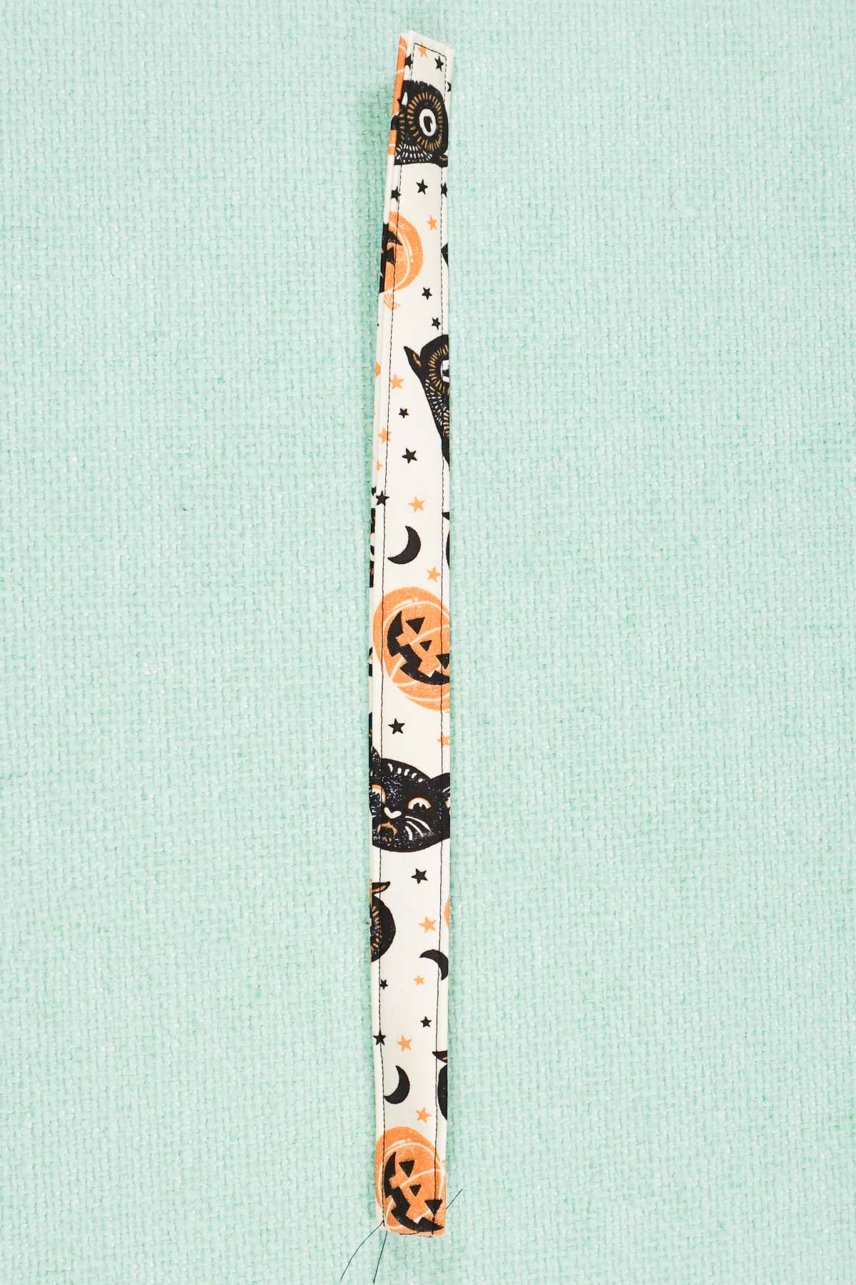 stitch straps on each long side