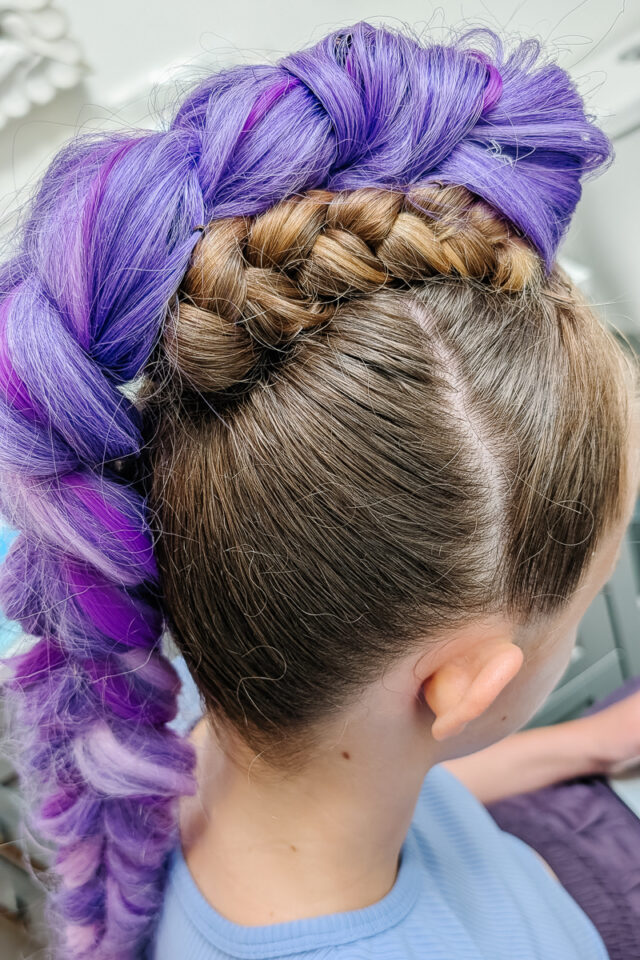 put purple braid over braid. bobby pin purple hair over the braids as best you can