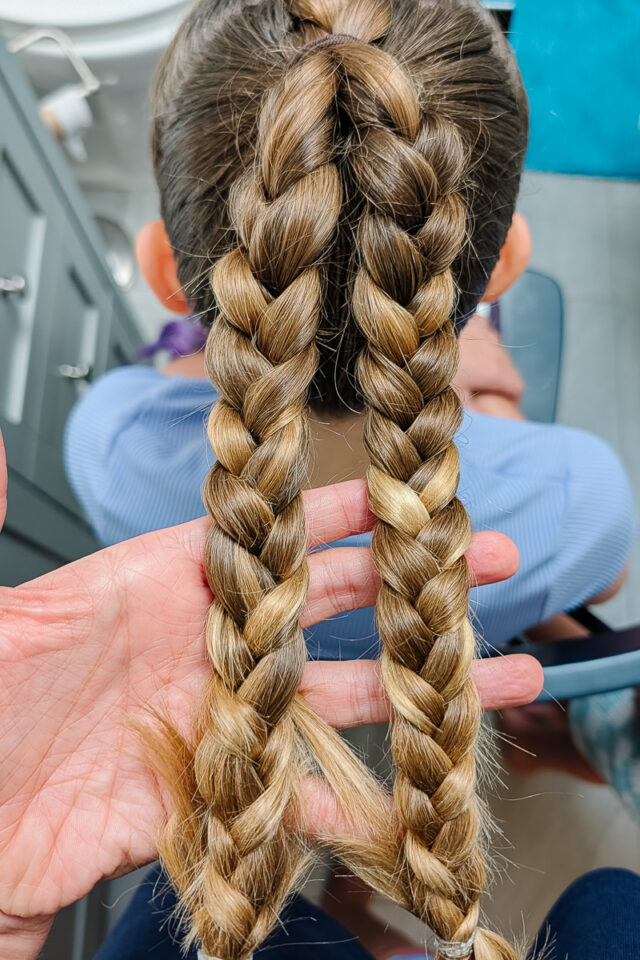 braid hair into two braids