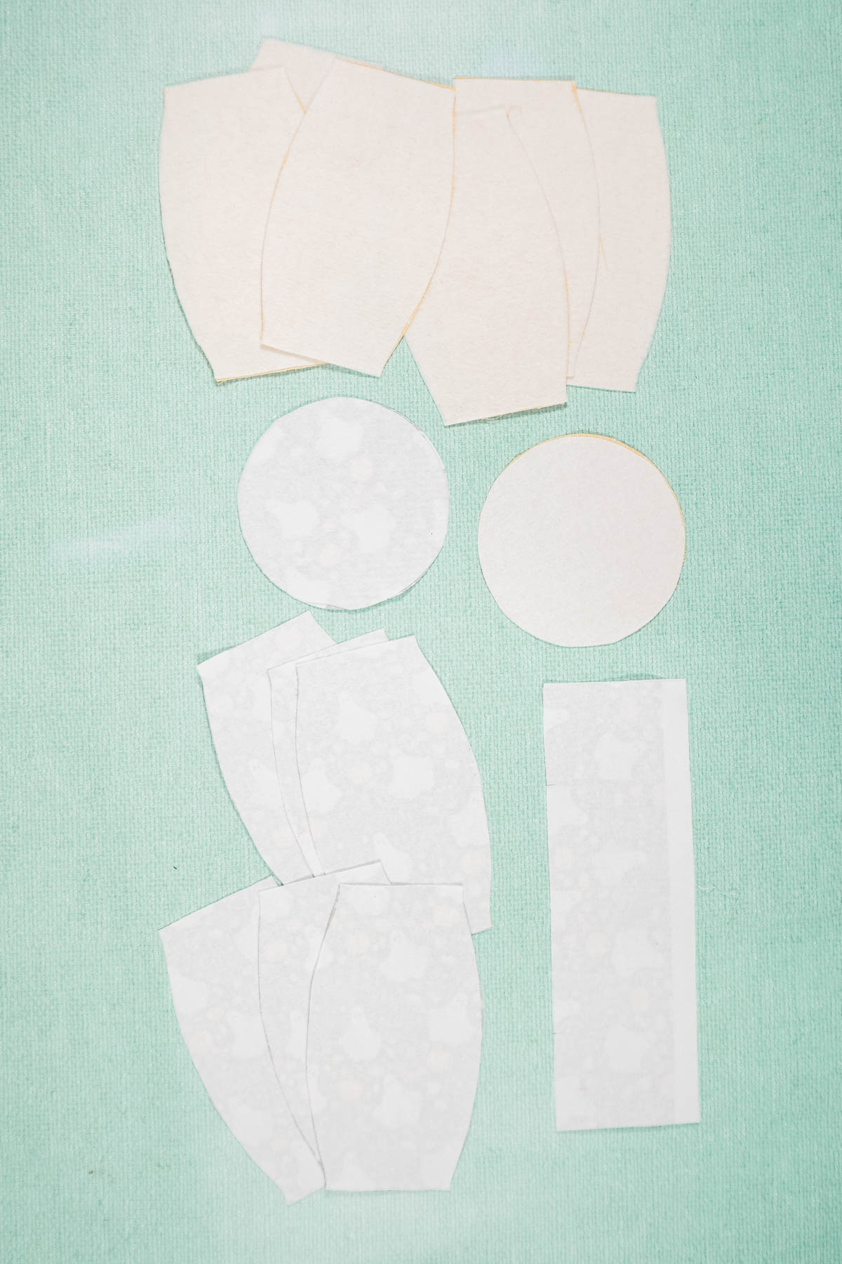 iron interfacing and fleece onto fabric pieces