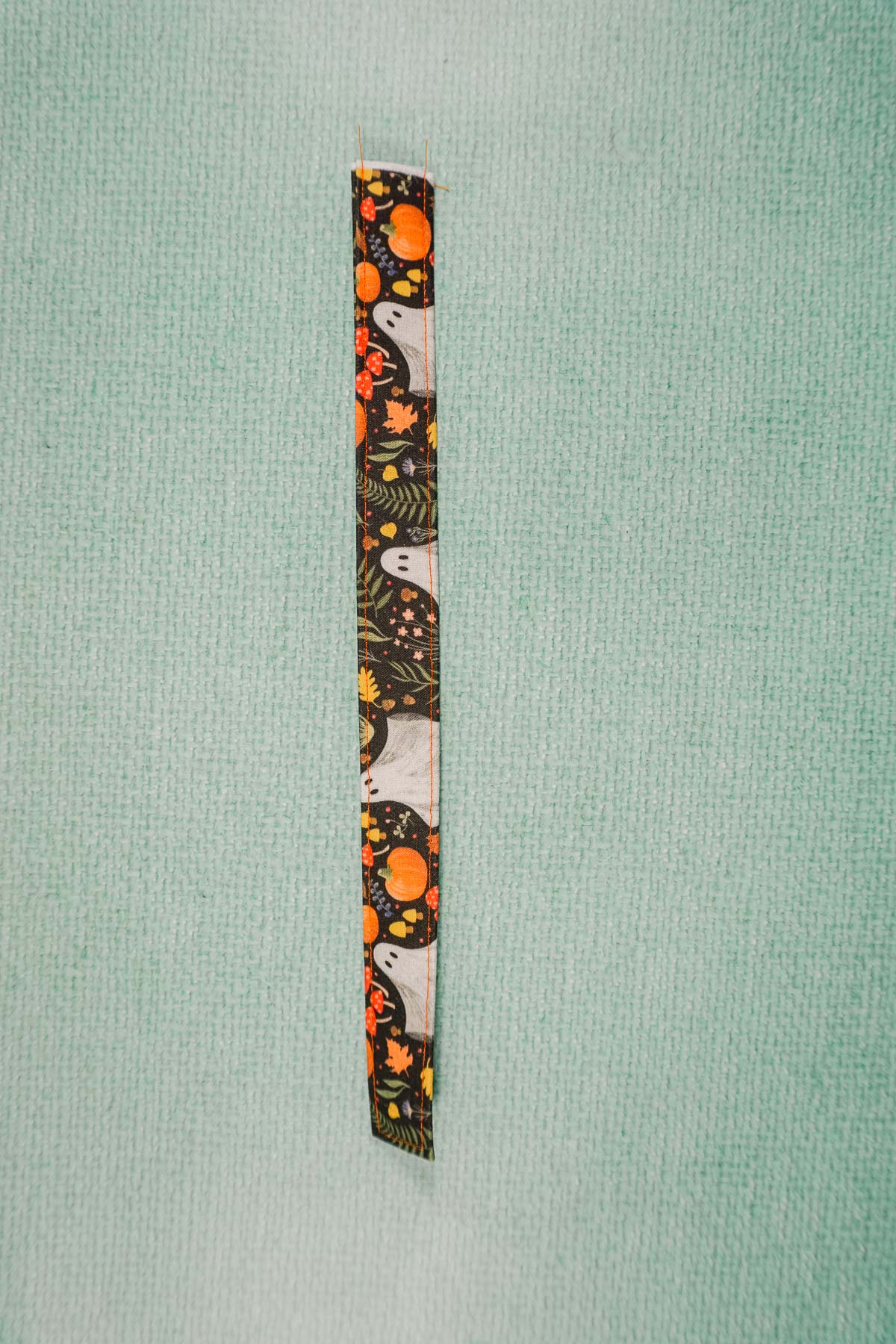 fold up strap and stitch along each side
