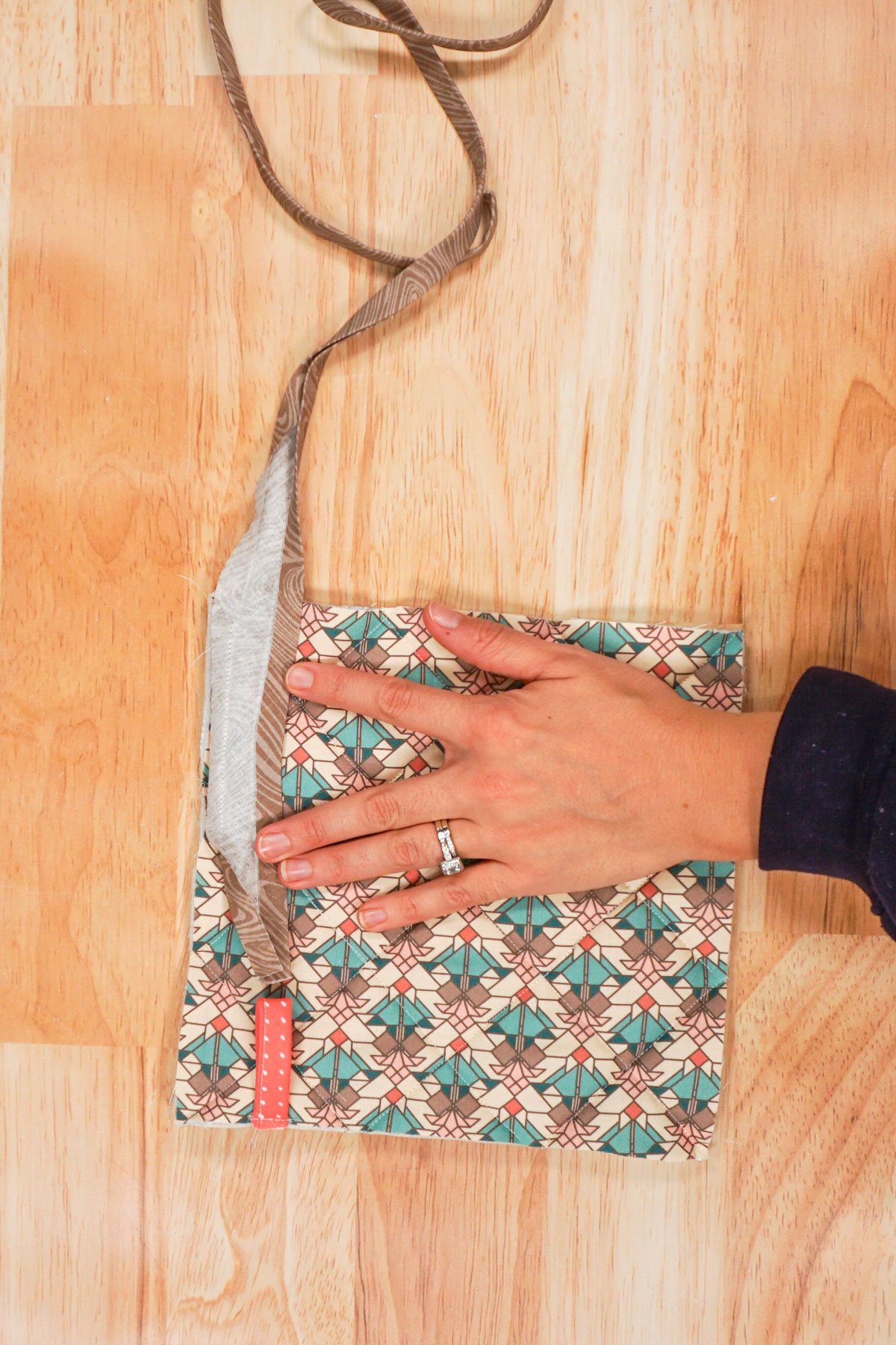 start sewing bias binding to one side and stop 3/8 inch from corner